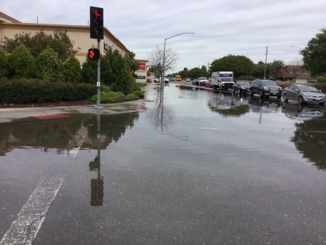 Flooding at the intersection of Pelandale and Chapman Ave
