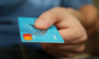 Credit Card in a man's hand