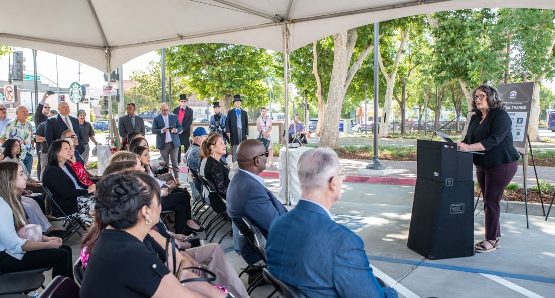 Mayor Sue speaking at transit center ceremony