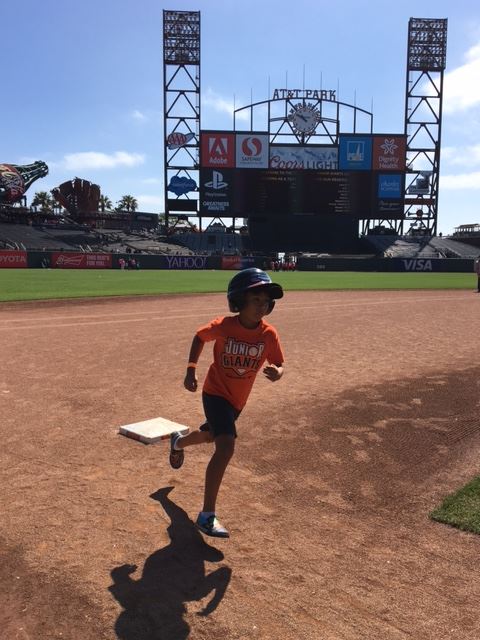 Baseball player running the bases