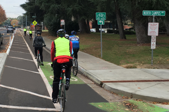 People riding bikes in bike lane